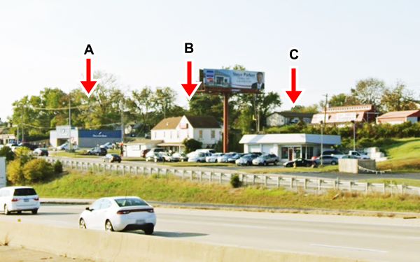I-44 cars and on side road, former gas station and buildings