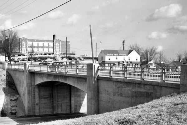 Central Ave. and Route 66 overpass, cars and buildings in a black and white photo 1956, Eureka MO