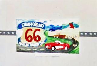 Mural on Strafford City Hall red car, highway and US66 shield in a mural