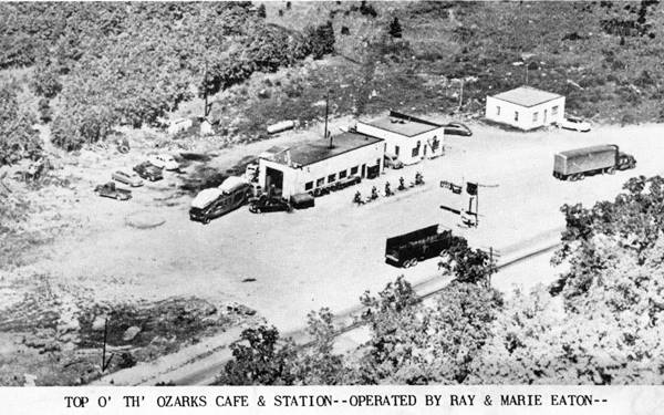 aerial view of cafe and gas station, black and white 1950s photo