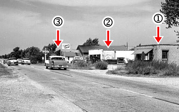 black and white 1950 photo of buildings and cars along Route 66 in Strafford MO