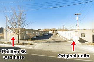 two lines of apartments perpendicular to Route 66 seen from the highway