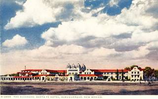 ABQ railway depot and Alvarado Hotel c.1920s postcard of a large complex in Spanish Revival style with hotel, and railroad depot
