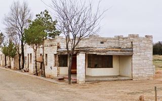Cactus Lodge stone building and rooms nowadays