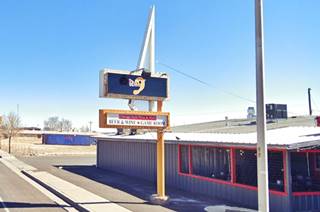 former Route 66 1950s neon sign Grants NM classic 1950s neon sign with triangular shape behind to horizontal rectangles