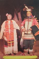 1940s color postcard Chief Rancho color postcard Native American man and woman, teepee behind, both in typical attire with feather headgear
