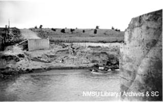 Dilia bridge Pecos River Route 66 1937, black and white, road leads to abutement, bridge is gone, Pecos river in the middle
