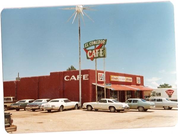 El Comedor 1980s, US66 Moriarty color 1980s postcard: cars parked by a restaurant, neon sign and star shaped ball atop the sign