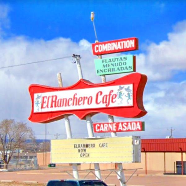 El Ranchero 1950s neon sign Milan NM. 1950s neon sign: main red box with curved shape supported by three slanting steel poles and 2 smaller boxes above and 2 below with additional text