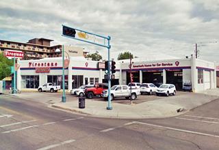 color picture, Firestone sign, L shaped tire store on a corner