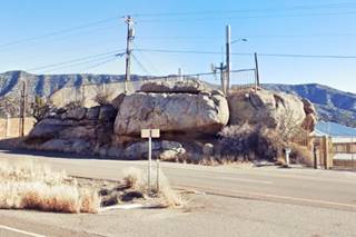 Glacier Boulder US66 Carnuel large white rock on the right side of a highway