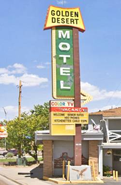 1950s neon, top: yellow figure with black letters reading GOLDEN DESERT, vertical panel in green with white word MOTEL, arrow below and more panels