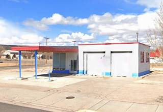 Conoco Grants US66 NM Former Conoco gas station, flat canopy, 2 service bays