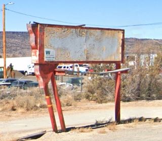 Sahara Drive In sign nowadays color view red faded former neon sign board covers former acrylic