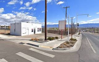 white icebox shaped gas station from the 1940s no canopy nor pumps facing Route 66