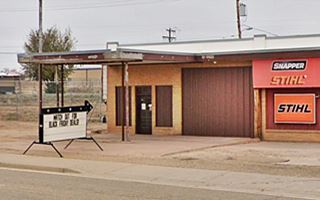 long one-floor 1950s gas station