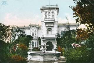 Huning Castle, Route 66 ABQ color postcard of a Italian style white colored mansion, with garden around it