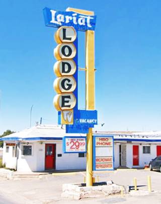 Lariat Lodge neon sign, Gallup Route 66 blue and yellow neon sign of the Lariat Lodge