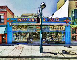 store front, with murals above plate glass windows, central entrance. This is Maisel&rsquo;s Indian Trading Post, Albuquerque, NM