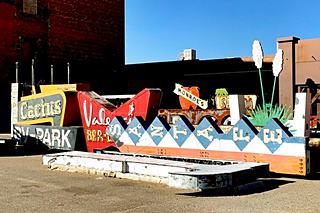 Neon Park, Albuquerque old 1950s neon signs piled up in a yard