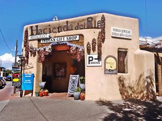 store on the corner of ABQ old plaza sells handicrafts, single floor, adobe bldg.