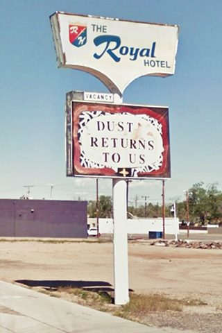 neon sign with ROYAL HOTEL written on it and in a box below VACANCY - DUST RETURNS TO US