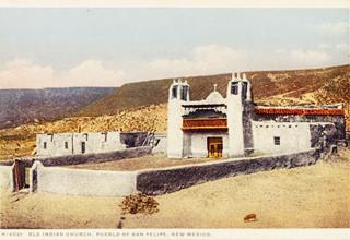 San Felipe Mission church NM Two steepled white adobe church faces an enclosed atrium, vintage color postcard