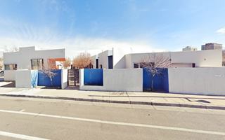 apartment complex seen from Route 66, units in a line corner office