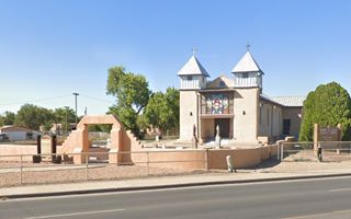 Valencia church NM Church, 2 steeples, atrium with low wall US 66 runs in front