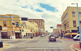 crossroads, traffic lights, cars and buildings