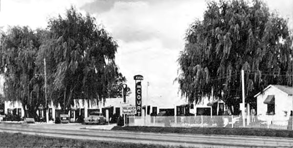 black and white photo 1930s motel and cars