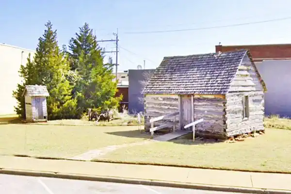 ancient log cabin, gable roof, outhouse