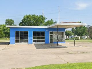 Old Gas Station with canopy, painted blue