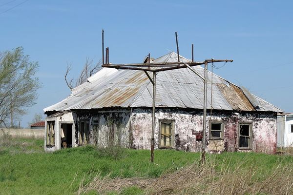 gable roof building in ruins