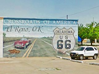 El Reno Crossroads of America Mural mural showing car on highway and US66 shield