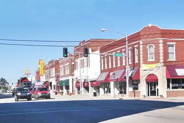 Red brick buildings, cars, street in Downtown