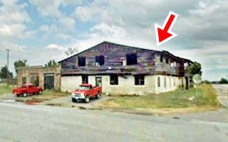 gable roof two floor addition to a stone wall garage