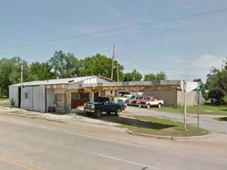 Old Tignor's Garage, Sayre old building with long canopy