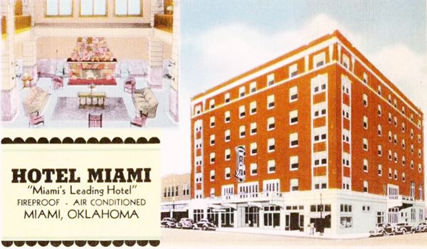 Hotel facade and lobby in a 1940s color postcard