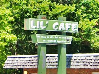 green neon sign, white letters