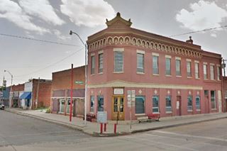 red brick building on a corner