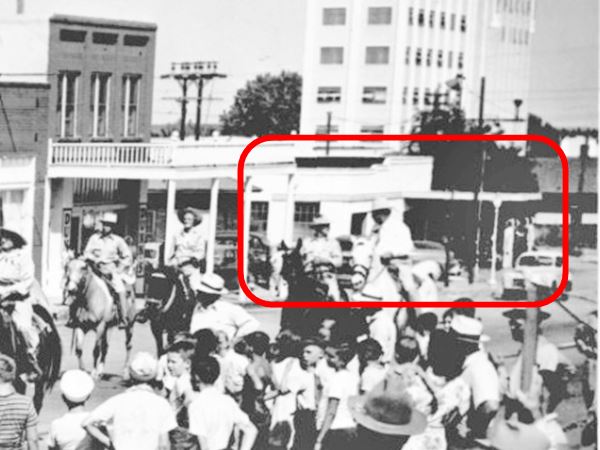 black and white picture parade on Main St. Yukon in 1947 by A.Y. Owen