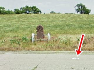 marker and monument in the grass