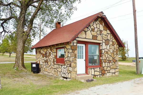 Old stone faced cottage style McDougal Filling Station