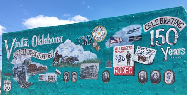 150 years of Vinita, a mural with images on a green background