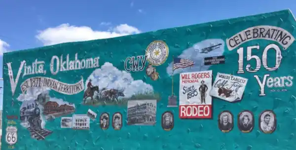 150 years of Vinita: mural with images on a green background