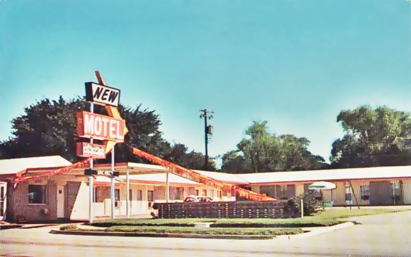 motel on Route 66 and car in a color 1960s postcard