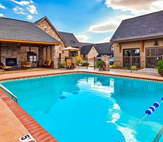 stone faced building, swimming pool