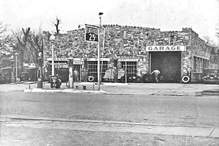1930s photo gas pumps by rock faced building