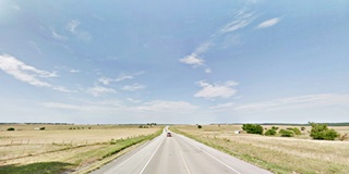 A straight and flat Route 66 in the fields of Oklahoma